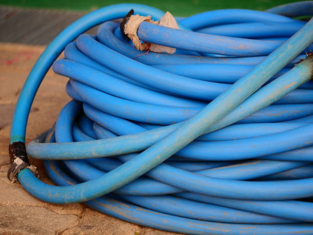istock Old blue rubber band on the ground 1135984418