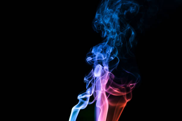istock Abstract backgrounds and wallpapers. Colorful smoke on black background.. 1135986361