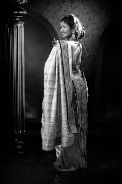 istock Young Lady performing Indian traditional folk dance 1135988788