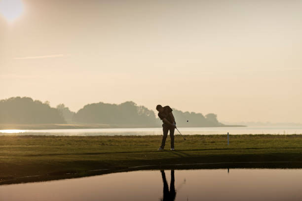 istock Golfer hitting the perfect wedge shot. 1135989080