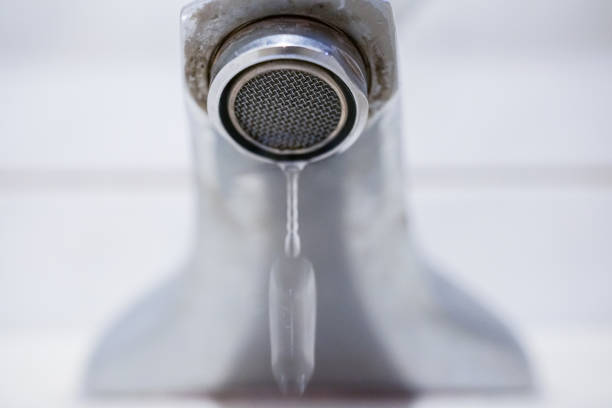 istock Faucet with water. In the bathroom. 1135989389