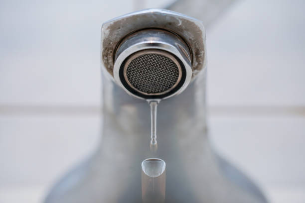 istock Faucet with water. In the bathroom. 1135990088