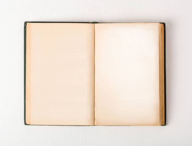 istock Open old book without text. Preparation for writing the text in the book. 1135992286