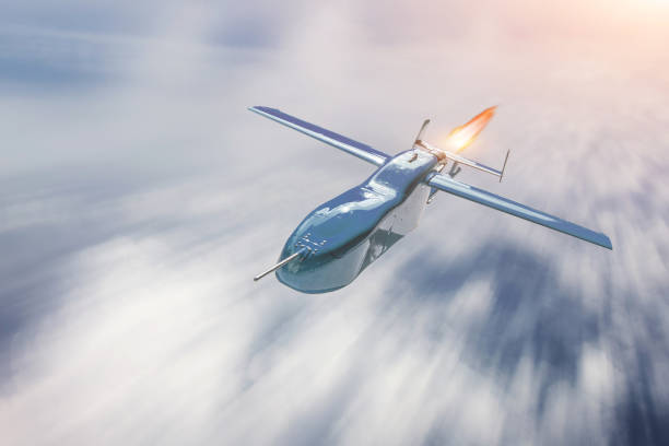 istock Unmanned military drone flying over cloudscape, motion blur speed. 1135992507