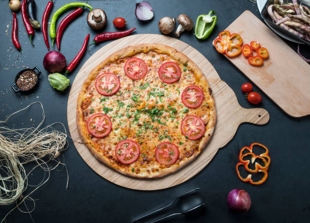istock Tasty pizza in the kitchen 1135993761