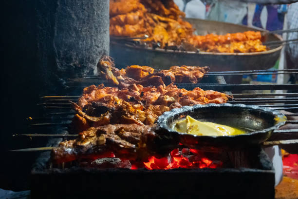 istock Chicken seekh kababs are being prepared road side 1135994649