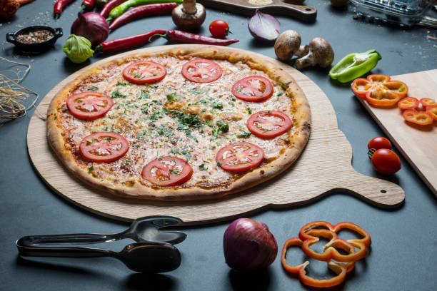 istock Tasty pizza in the kitchen 1135994666