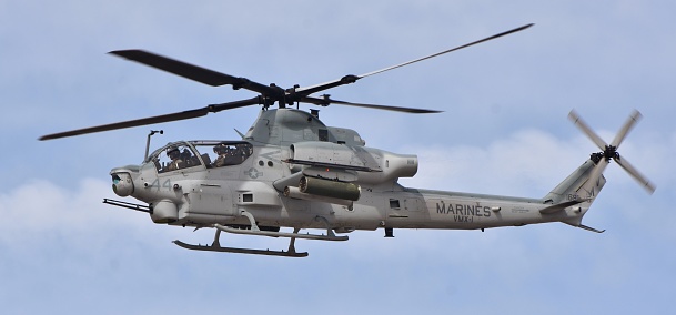 Yuma, USA - March 9, 2018: A U.S. Marine Corps AH-1Z Viper attack helicopter flying at Marine Corps Air Station Yuma. This AH-1Z Viper belongs to the VMX-1 squadron and is performing a training flight.