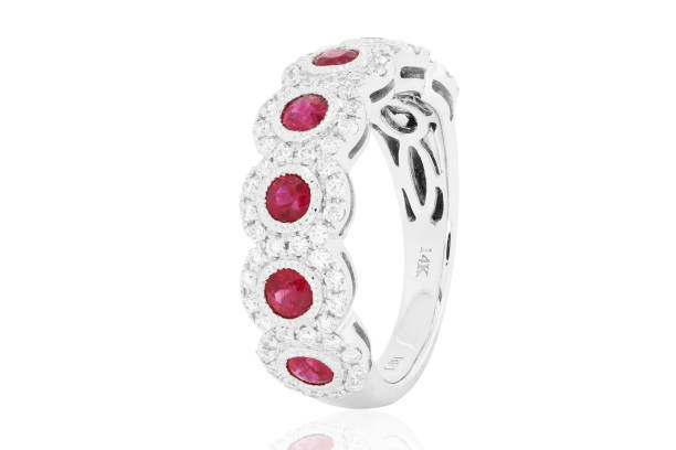istock jewelry diamonds with and gemstone emerald ruby and Sapphire ring earrings 1135999568