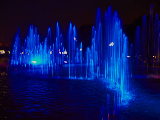 istock Fountain at night with blue lighting with lots of jets 1136000244