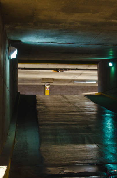 istock The long wet garage ramp under the street 1136001343