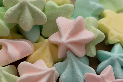 Sweet food. Adorable homemade colorful meringues. Candy color meringues