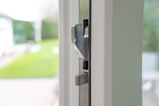 istock Close-up, shallow focus of a high-security latching system seen on a newly installed double glazed door. 1136003319