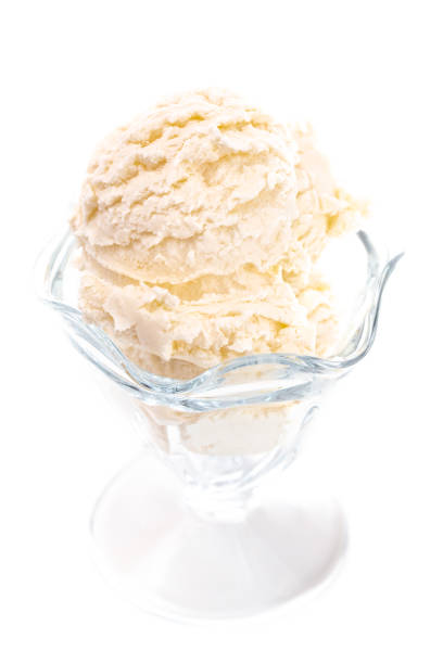 istock Scoops of Vanilla Ice Cream on a White Background 1136005318