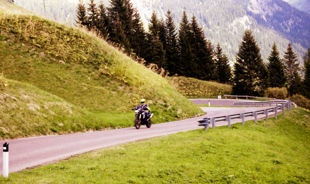 istock Biker on motorcycle in mountain road, European Alps 1136006528