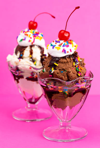 istock A Chocolate and Vanilla Sundae on a Pink Background 1136007823