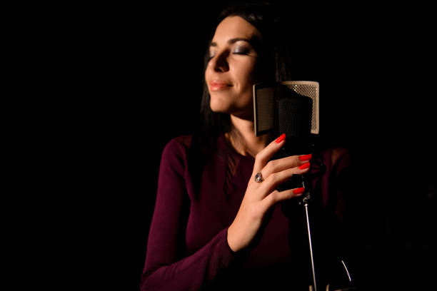 istock Professional musician recording new song in studio. 1136008725