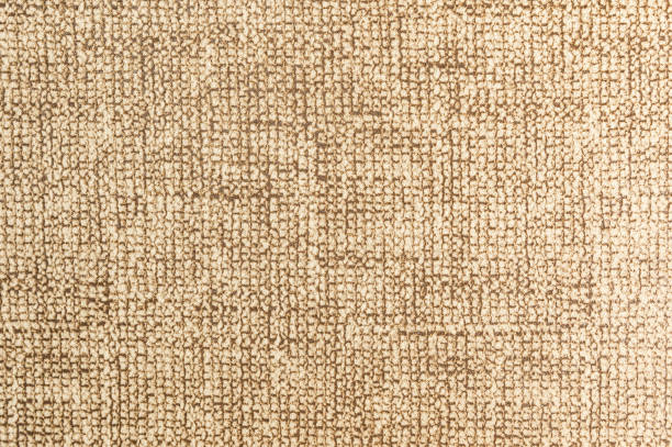 istock Textured background large beige textile. Texture of textile fabric close-up 1136012828