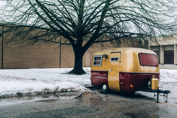 istock Camp trailer on the parking lot in winter 1136015643