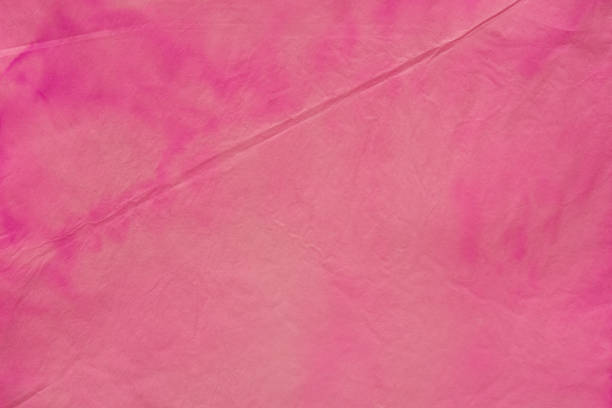 istock red watercolor painted background texture on creased paper 1136017549