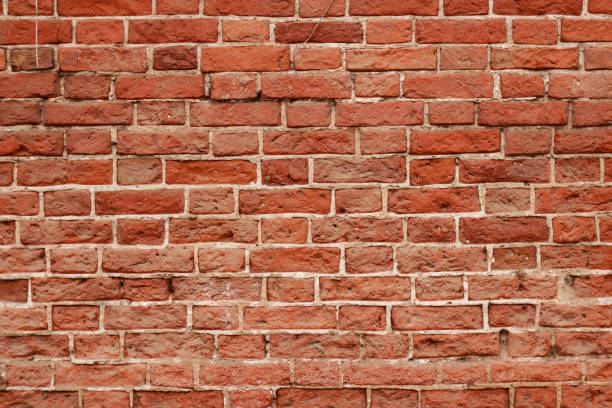 istock grunge texture red brick wall urban background. abstract old backdrop retro vintage wallpaper 1136018379