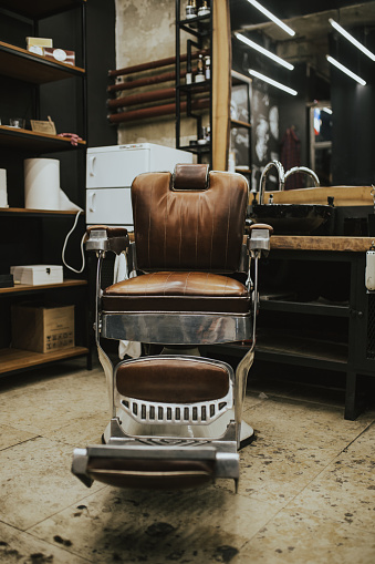 Old vintage chair in barber shop.