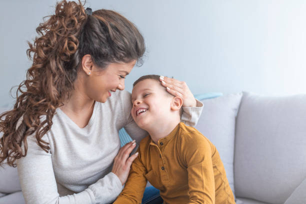 Mother holding child in arms