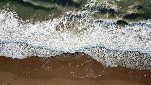 istock Drone aerial view sea waves. Blue water background 1136024164