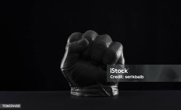 Black Fist On A Black Background Stock Photo - Download Image Now - Abstract, Arm, Art