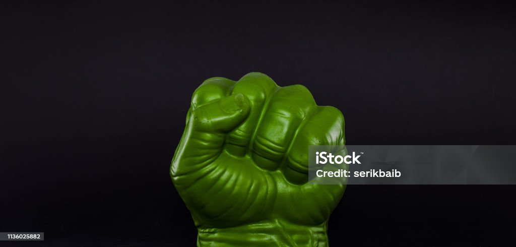 Green toy fist Abstract Stock Photo