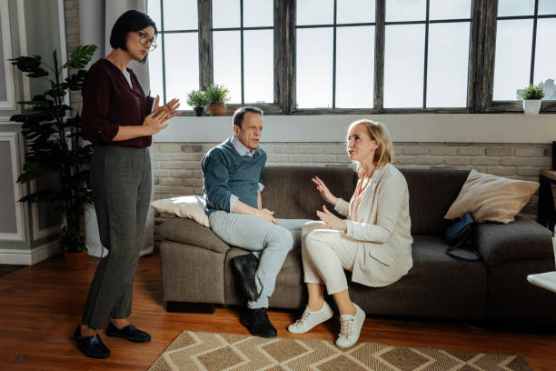 istock Confused middle-aged couple dealing with problems in family life 1136029610