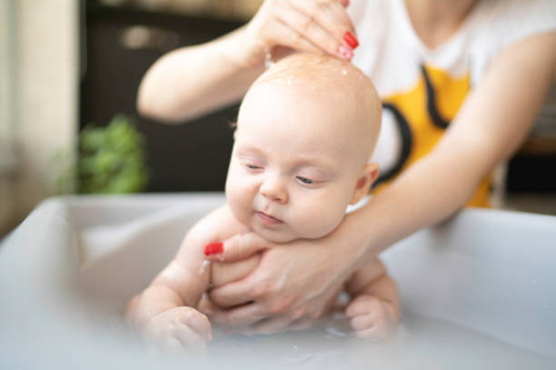 istock Cute Little baby taking a shower 1136030769