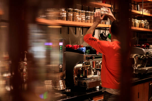 istock Barista Making Coffee For Customers At Cafe 1136033108