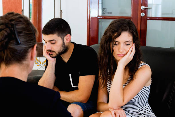 istock Young couple with a problem to consult a psychologist 1136036095