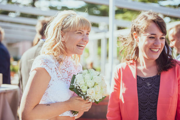 istock Bride Having Fun With Her Friends After Wedding Ceremony 1136037859