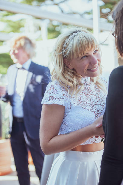 istock Bride Receiving Congratulations after Being Married 1136037871