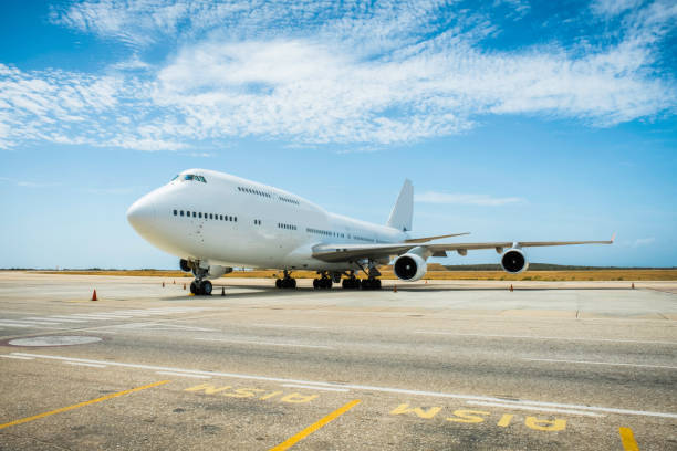istock Airplane parked at the airport 1136038786