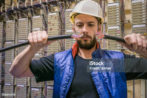 Computer Backbone Wire Engineer In A Helmet Will Connect The Damaged Internet Backbone Wire ...