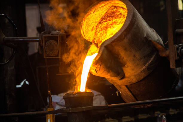 istock metal casting process with red high temperature fire in metal part factory 1136045924