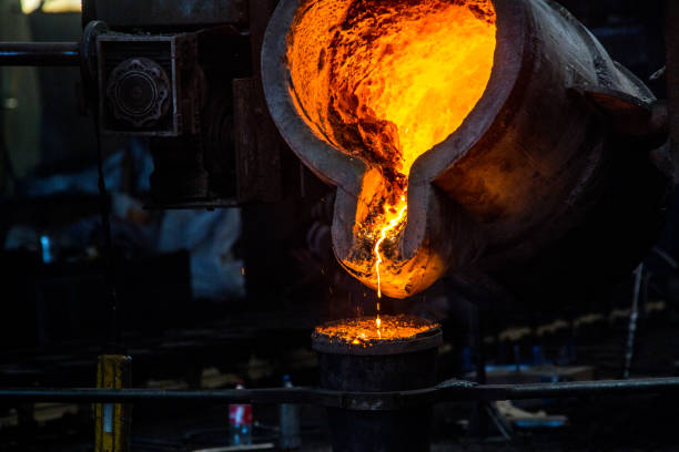 istock metal casting process with red high temperature fire in metal part factory 1136045933