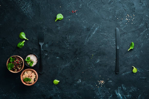 istock Preparing for cooking. Spices, vegetables, kitchen board. Top view. Free space for your text. Rustic style. 1136046134
