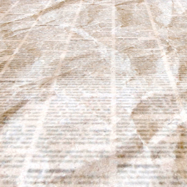 istock Newspaper with old vintage unreadable paper texture background 1136048125