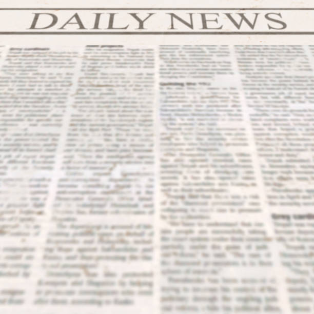 istock Daily news newspaper with headline and old unreadable text 1136048132