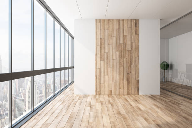 istock Contemporary office with empty wooden wall 1136049207