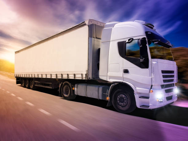 istock Trailer for goods transportation, moving with sunset 1136050074