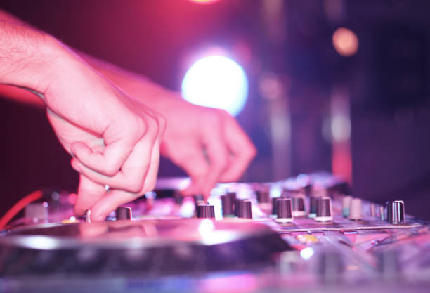 istock DJ Mix in Nightclub 1136052672