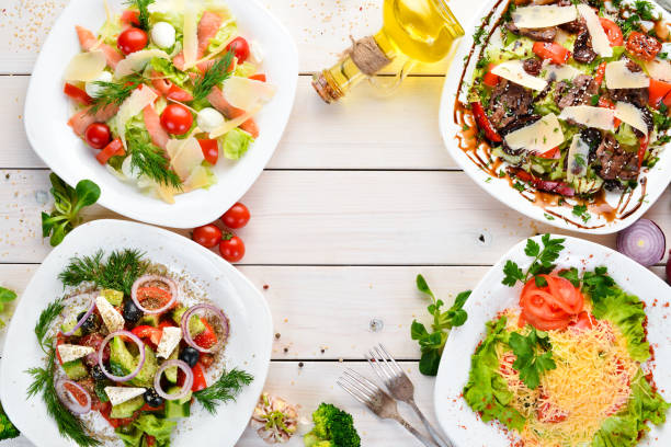 istock A large selection of vegetable salads. Top view. free copying space. 1136053302