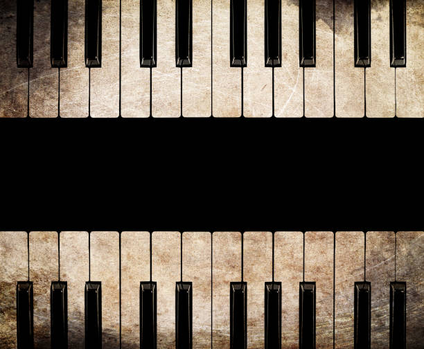 istock vintage piano isolated on black background 1136054348