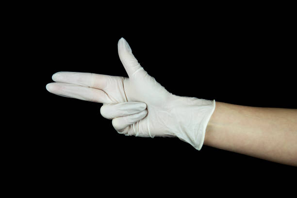 istock hand with white Glove on black 1136055531