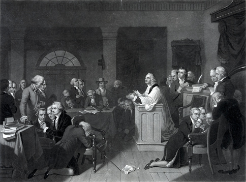 Vintage engraving features a moment of prayer in the first session of the Continental Congress on September 5, 1774.